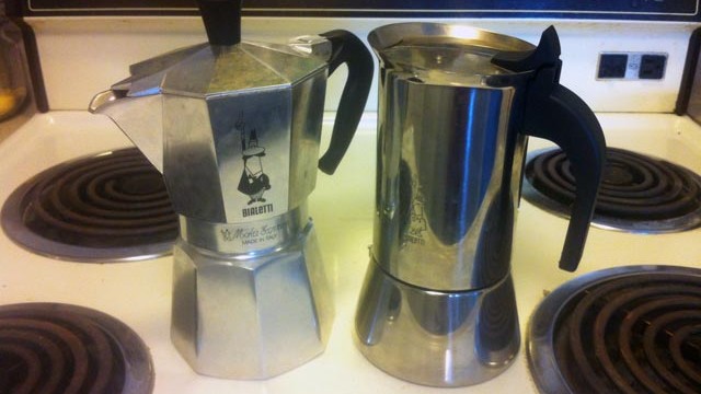 Photo of stainless steel Bialetti brand moka pot (right) and aluminum model (let).