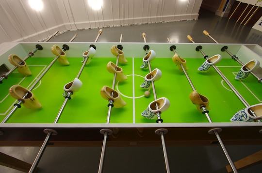 Fussball table using wooden clogs instead of small men