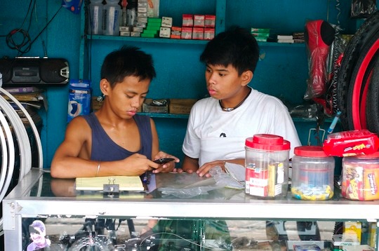 Bike store employees behind the counter