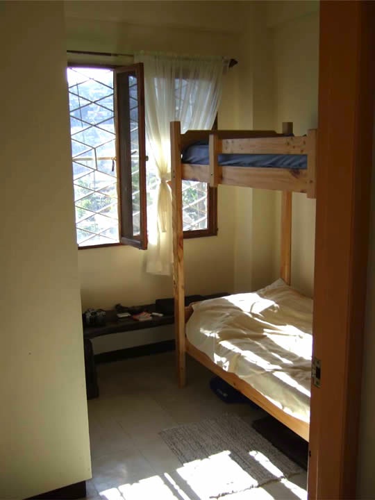 A bunkbed and a closet