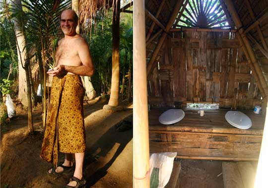 A man, John Button, and a compost toilet with two seats