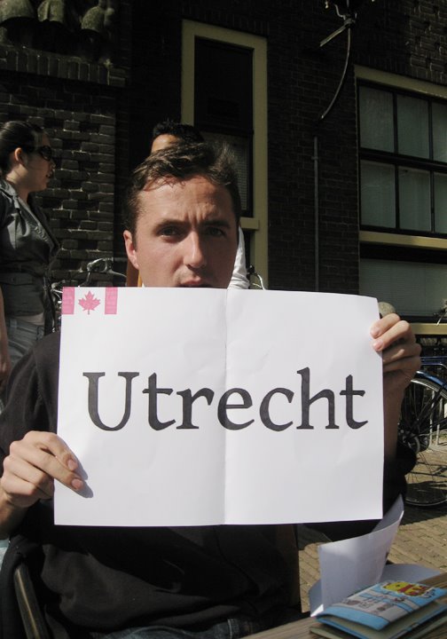 Picture of Jeff Werner holding a sign that says Utrecht