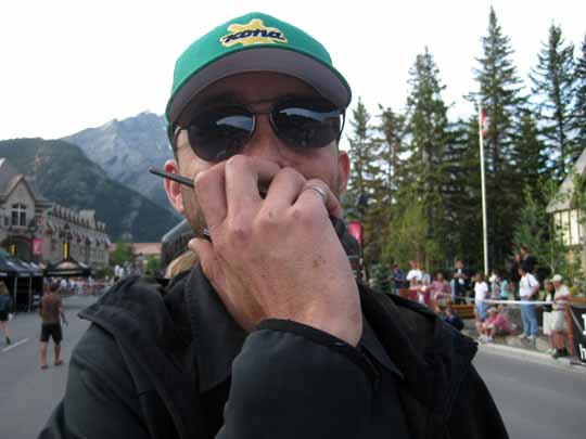 Close-up of man's face talking on portable radio