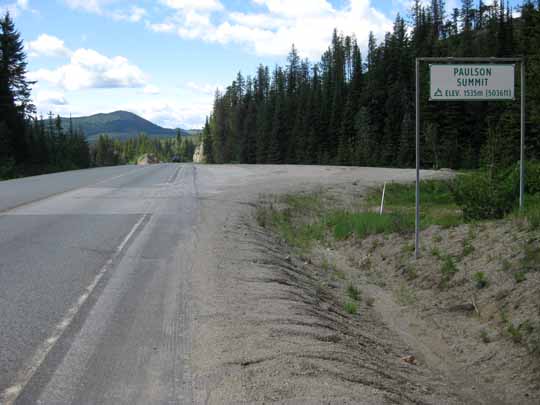 Top of road pass with sign